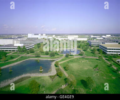 This North-looking view shows some of the Johnson Space Center's central buildings and facilities neighboring its Project Management Facility (Building 1) from which this scene was photographed. The Houston-based Mission Control Center is in the center of the frame. Visible buildings surrounding the mall area include the Flight Operations Facility, Crew Systems Laboratory, Photographic Technology Laboratory, Technical Services shop, branch cafeteria, Mission Control Center office wing and the Central Data Office.  Image # : S82-41180 Stock Photo