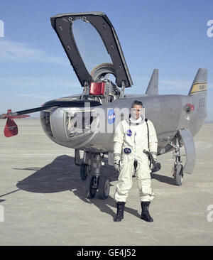 NASA research pilot John A. Manke is seen here in front of the M2-F3 lifting body. Manke was hired by NASA on May 25, 1962, as a flight research engineer. He was later assigned to the pilot's office and flew various support aircraft including the F-104, F-5D, F-111 and C-47. The M2-F3 reached a top speed of l,064 mph (Mach 1.6). Highest altitude reached by the vehicle was 7l,500 feet on December 21, 1972, the date of its last flight with NASA pilot John Manke at the controls. The information the lifting body program generated contributed to the data base that led to development of today's Spac Stock Photo