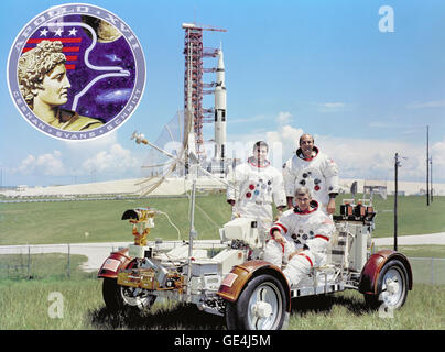 (September 30, 1972) The prime crew for the Apollo 17 lunar landing mission are: Commander, Eugene A. Cernan (seated), Command Module pilot Ronald E. Evans (standing on right), and Lunar Module pilot, Harrison H. Schmitt. They are photographed with a Lunar Roving Vehicle (LRV) trainer. Cernan and Schmitt will use an LRV during their exploration of the Taurus-Littrow landing site. The Apollo 17 Saturn V Moon rocket is in the background. This picture was taken at Pad A, Launch Complex 39, Kennedy Space Center (KSC), Florida, The Apollo 17 emblem is in the photo insert at upper left. Apollo 17 la Stock Photo