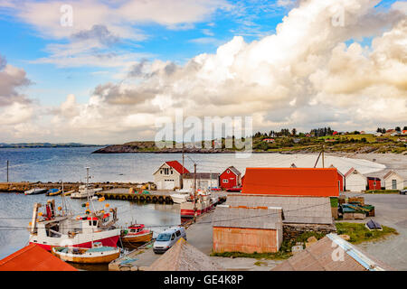 Fishing boats in small harbor on Norway. Stock Photo