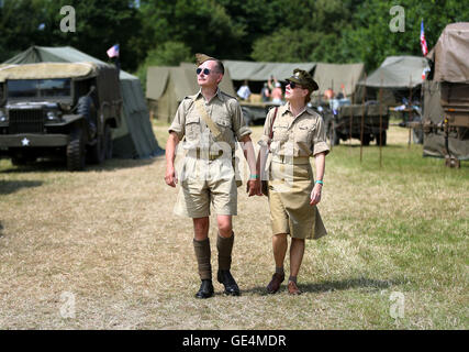 A couple dressed in military uniforms as the War and Peace Revival continues near Folkestone, Kent. Stock Photo