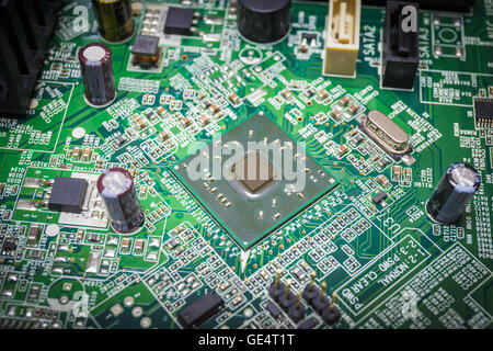 Close-up on a CPU microchip on a scheme in mainboard is heart important computer or electronic circuits Stock Photo