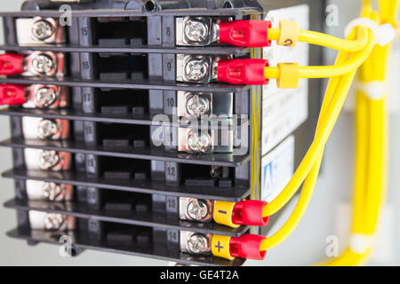 Electrical control panel line with static energy meters and safety circuit Stock Photo