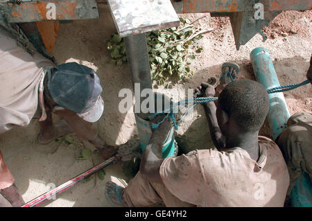 In Africa water is in-depth, it is necessary to make a drilling. Stock Photo