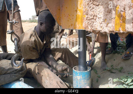 In Africa water is in-depth, it is necessary to make a drilling. Stock Photo