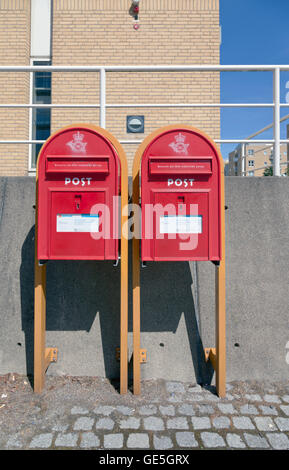 Two PostNord (earlier PostDanmark) post boxes in Copenhagen Stock Photo