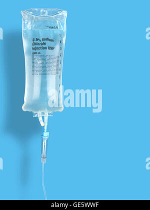 IV drip chamber, IV tubing, and IV bag of solution with copy space. Stock Photo