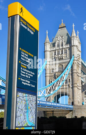 Modern Legible London street sign with pedestrian information & local map beside Tower Bridge Southwark England UK Stock Photo