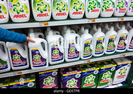Shelves filled with Ariel, a line of laundry detergents, in a wholesale. Stock Photo