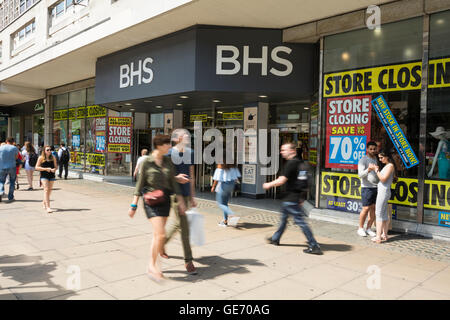 Shoppers pass in front of the former flagship BHS store on London's Oxford Street. Stock Photo