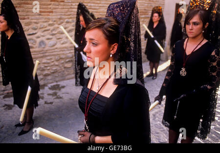 Mantillas. procession in Calle San Juan de los Reyes. Brotherhood of `Via Crucis´.Albaicin.Granada. Andalusia, Spain Stock Photo