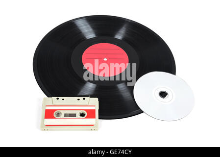 Music storage devices - vinyl record, analog cassette and CD isolated on white background with clipping path Stock Photo