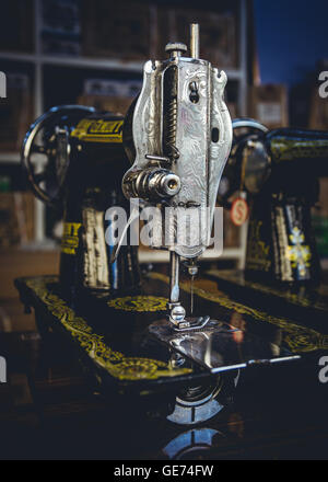 Heavy duty vintage Singer sewing machines for sale as seen in a shop in Yangon, Myanmar. Stock Photo