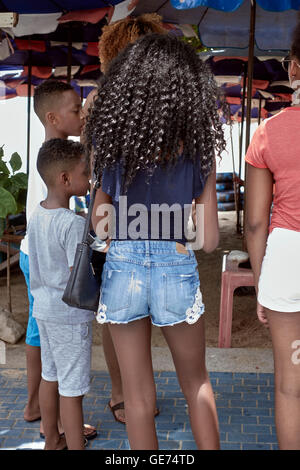 Hair. Young teenage black girl sporting her crinkly Afro Caribbean hair style.