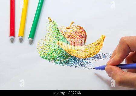 Man's hand drawing a still life using color markers. Pointillism technique. Stock Photo