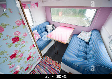 shabby chic old caravan, renovated with cath kidston interior design caravan owner, revamped for a new generation Stock Photo