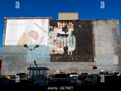 Old peeling advert for a mattress on the side of a building in Seattle. Stock Photo