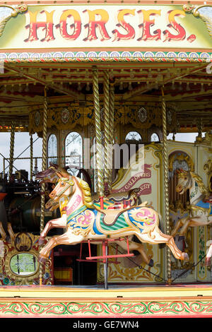 Fairground traditional galloping horses Stock Photo
