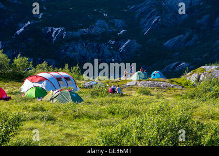 Colorful tents, wild camping group in mountains, Lofoten, Arctic Norway Stock Photo