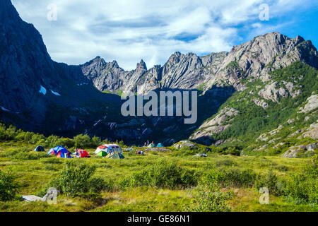 Colorful tents, wild camping group in mountains, Lofoten, Arctic Norway Stock Photo