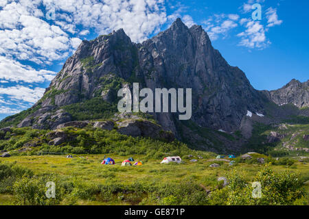 Colorful tents, wild camping group in mountains, Lofoten, Arctic Norway Stock Photo