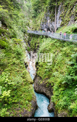 MITTENWALD, GERMANY - JULY 9: People hiking through Leutasch gorge in Mittenwald, Germany on July 9, 2016. The gorge is open for Stock Photo