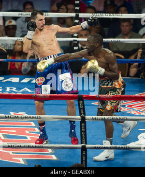 Las Vegas, USA. 23rd July, 2016. Terence Crawford (R) of the United States fights with Viktor Postol of Ukraine during their WBC-WBO junior welterweight title unification boxing bout in Las Vegas, the United States, July 23, 2016. Terence Crawford won both the fight and a possible ticket into the Manny Pacquiao sweepstakes. © Yang Lei/Xinhua/Alamy Live News Stock Photo