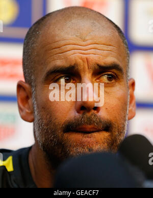 (160724) -- BEIJING, July 24, 2016(Xinhua) -- Pep Guardiola, manager of Manchester City looks on during the press conference for the match against Manchester United FC of 2016 International Champions Cup China soccer tournament at Olympic Sports Center Stadium in Beijing, China, on July 24, 2016. The derby will be held at the National Stadium, or the Bird's Nest, on Monday. (Xinhua/Wang Lili) Stock Photo