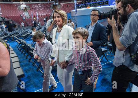 Philadelphia, Pennsylvania, USA. 24th July, 2016. House minority leader Nancy Pelosi walks through the Wells Fargo Arena with her grandchildren a day before the start of the Democratic National Convention July 24, 2016 in Philadelphia, Pennsylvania. Credit:  Planetpix/Alamy Live News Stock Photo