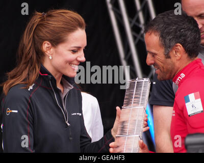 Portsmouth, UK, July 24 2016. The Duchess of Cambridge presents the second place trophy to Franck Cammas, Skipper of Groupama team France at The Americas Cup World Series in Portsmouth. Credit:  simon evans/Alamy Live News Stock Photo