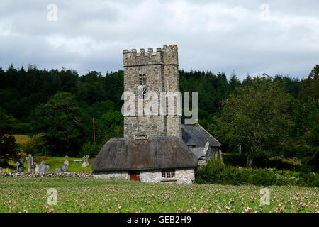 Saxon church at Buckland-in-the-moor with the famous clock face 'My Dear Mother' commissioned by the Whiteley family in memory Stock Photo