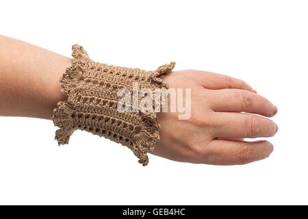 Knitted handmade brown bracelet isolated on white background Stock Photo