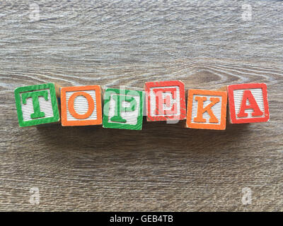 TOPEKA city name written with wood blocks characters Stock Photo