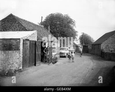Garmston in Shropshire English village scene 1950s with blacksmiths smithy. Garmston Smithy and blacksmith. Stock Photo