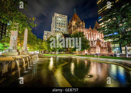 Fountains and Trinity Church at Copley Square at night, in Boston, Massachusetts. Stock Photo