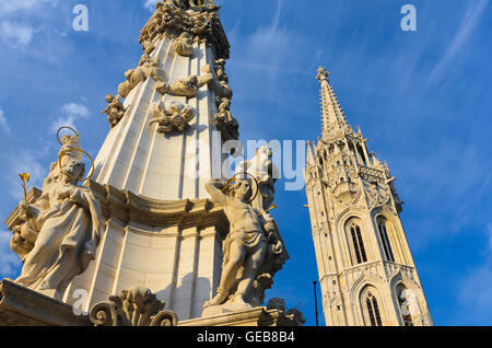 Budapest: szentharomsag ter ( Holy Trinity Square ) with Plague column, Matthias Church, Hungary, Budapest, Stock Photo