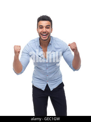 Handsome business man excited hold hands fist up shouting Stock Photo