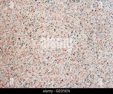 Pink granite polished texture surface close up background Stock Photo