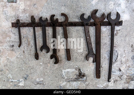 Spanners hanging on the wall inside the National Slate Museum in Llanberis, Wales. Stock Photo