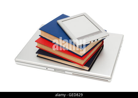 reader, laptop  and books on a white background Stock Photo
