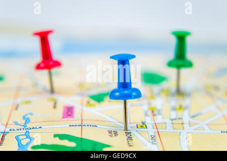 Push pins on map Stock Photo