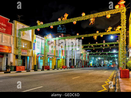 Singapore, Singapore - February 29, 2016: Singapore South Bridge Road in Chinatown decorated with illuminated red lanterns due to the celebration of the Chinese New Year. At night Stock Photo