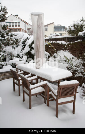 Snow-covered sitting area with sun shade on the terrace, winter, Stuttgart, Baden-Wuerttemberg Stock Photo