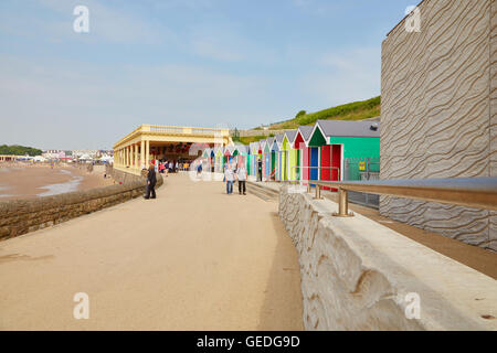 Whitmore Bay, Pavillion and beach huts, at Barry Island, South Wales, UK Stock Photo