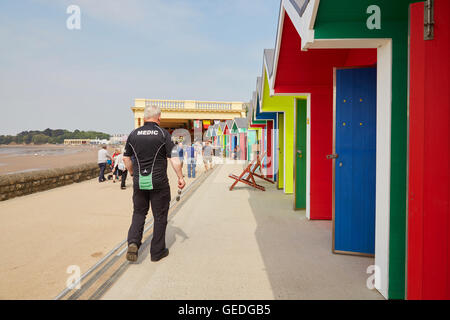 A medic on site at Whitmore Bay beach huts at Barry Island, South Wales, UK Stock Photo