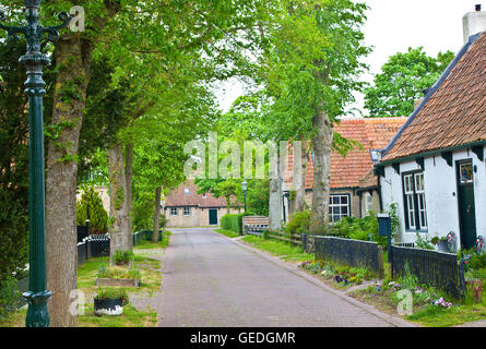 View of typical historic street in Ameland, The Netherlands Stock Photo