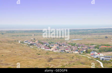 View at typical Dutch houses on island Ameland, The Netherlands Stock Photo