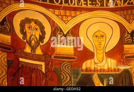 Detail of paintings in central apsis.Apostle and virgin with Grail.Church of Sant Climent.Romanesque church. Taüll.  Boí valley. Stock Photo