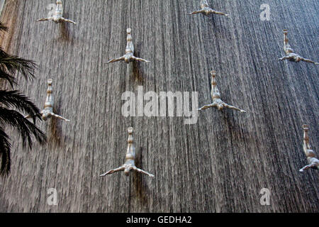 Sculpture diving men in Dubai mall Stock Photo
