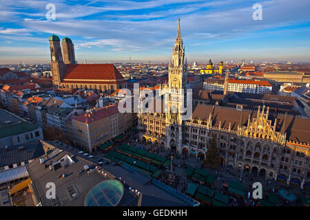 geography / travel, Germany, Bavaria, Munich, Aerial view of the Marienplatz during the Christkindlmarkt (Christmas Markets) in front of the Neues Rathaus (New City Hall) and the Frauenkirche, aka Domkirche zu Unserer Lieben Frau, (Cathedral of our Blessed Lady) in the City of München (Munich), No-Exclusive-Use Stock Photo